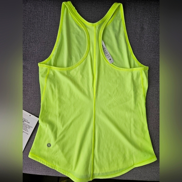 NWT. Lululemon, size 6, neon yellow, base pace tank - Picture 2 of 4